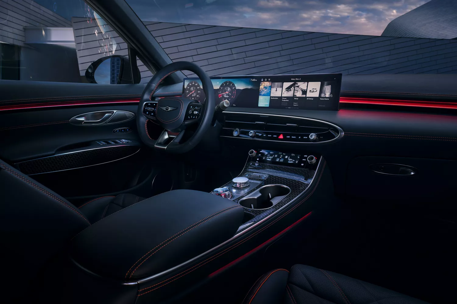Interior of a 2026 Genesis GV70, featuring a sleek dashboard with digital displays, a central console with controls, and ambient lighting.